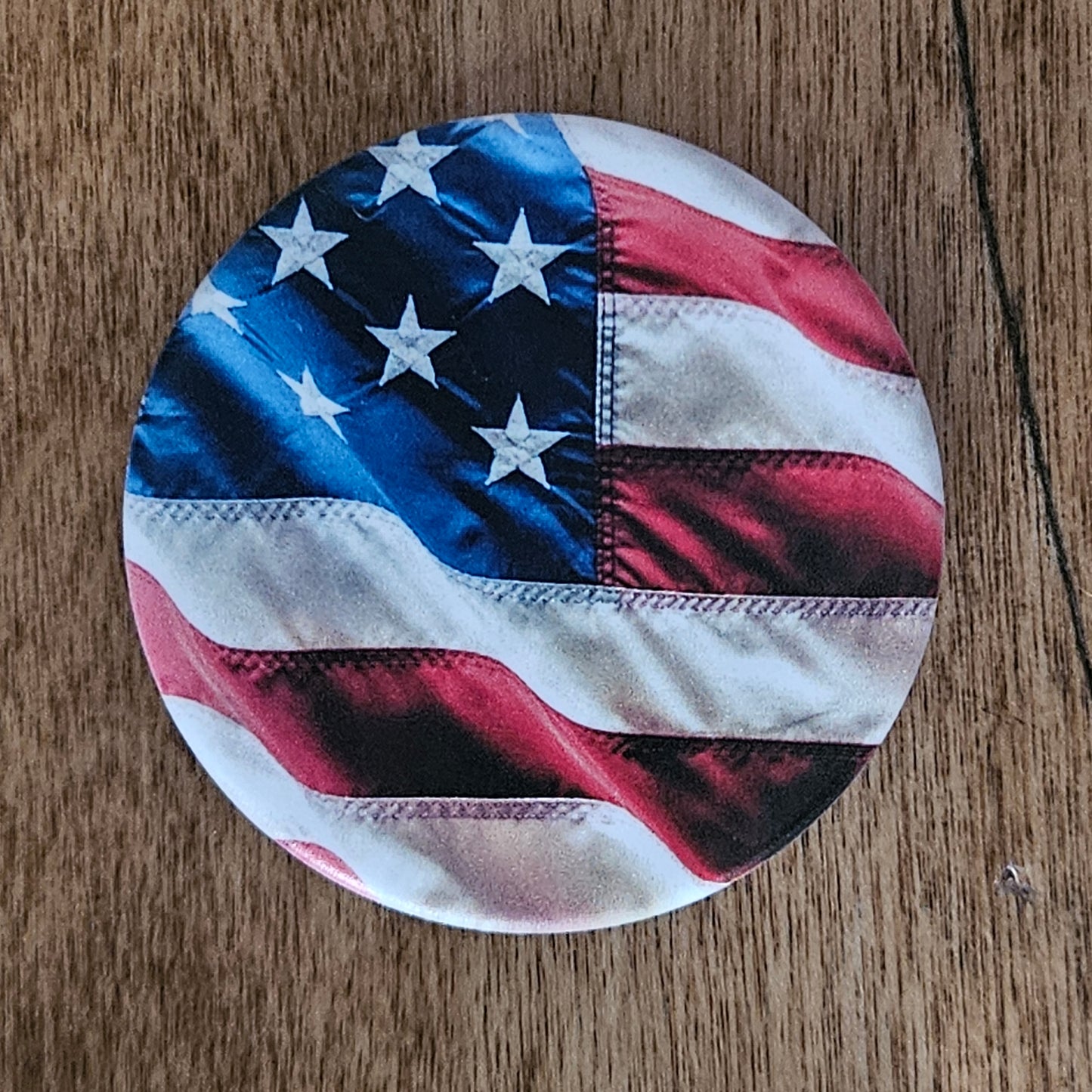 PopGrip addon for Quadlock Rokform adapters with American flag design on wood surface