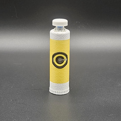Clicky fidget with storage compartment DBZ in yellow and white with Capsule Corp logo design