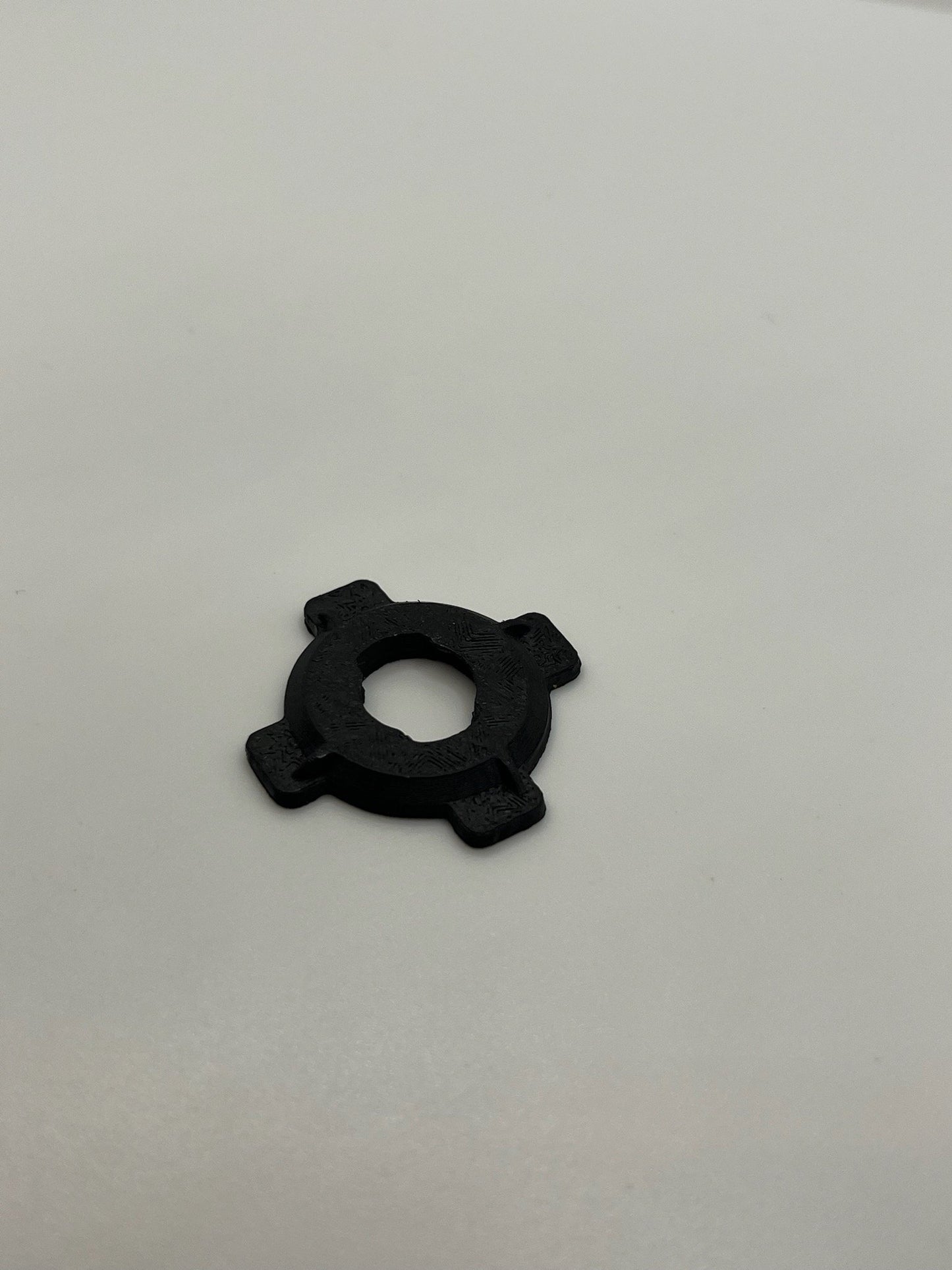 Black Rokform PopSocket adapter accessory for mounting and attachment