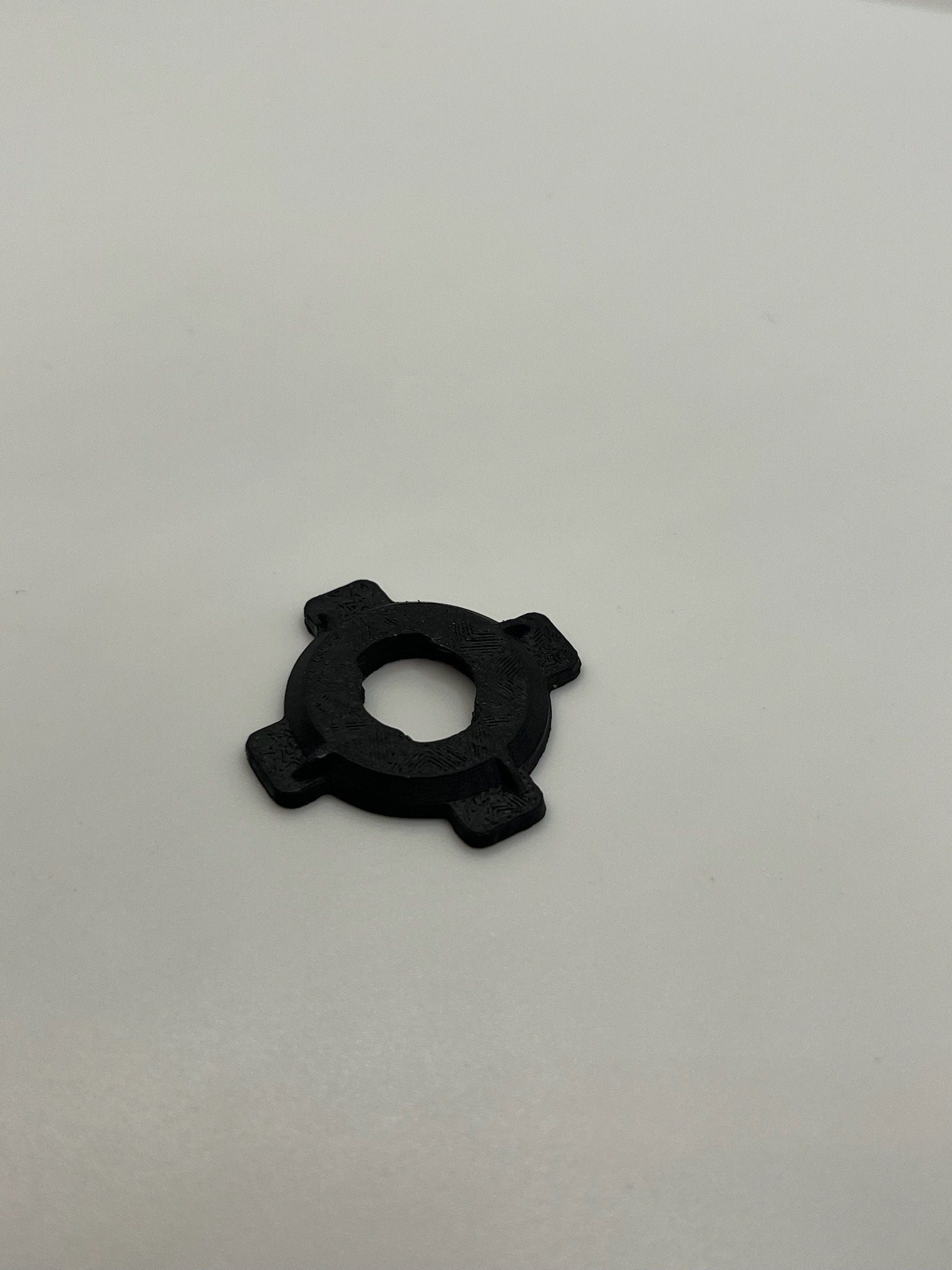 Black Rokform PopSocket adapter accessory for mounting and attachment