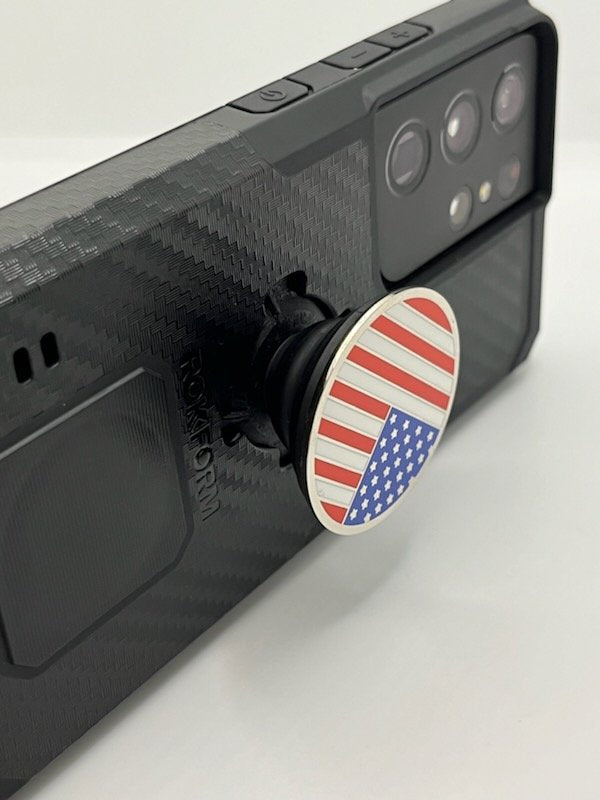 Rokform PopSocket adapter attached to black phone case with American flag design